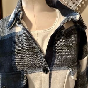 you’re looking at a long warm boutique, coat size medium